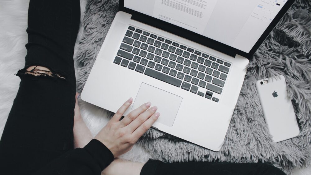 A-woman-using-a-computer-at-home-for-online-learning