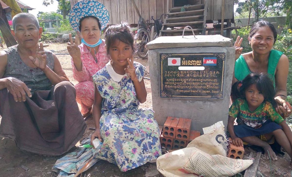 カンボジアの家族と井戸